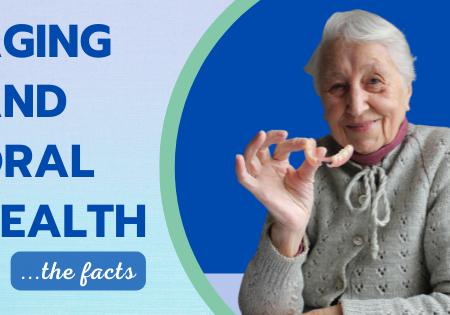 elderly woman holding dentures